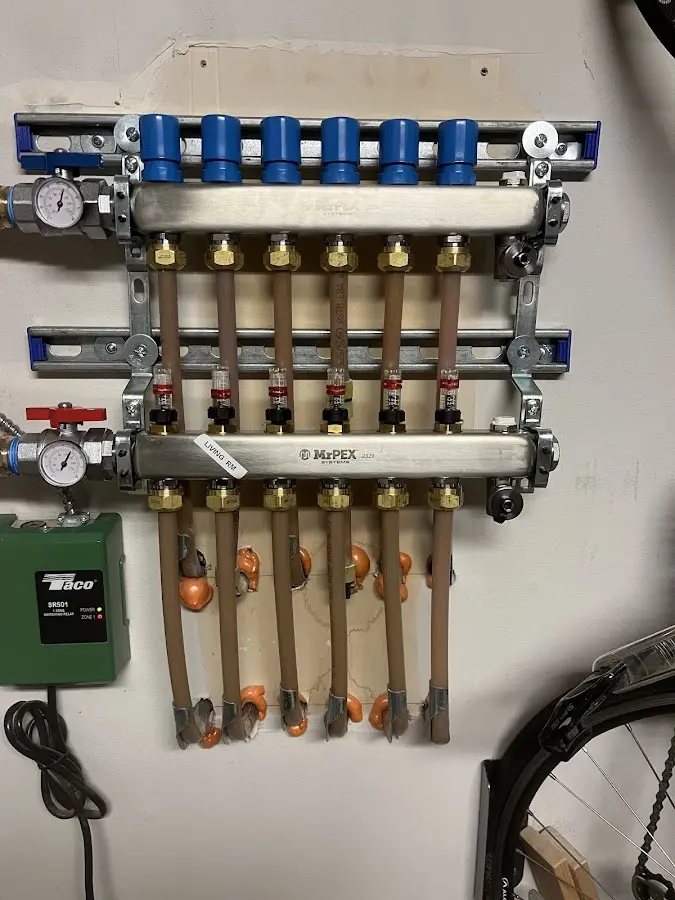 Plumber performing Water Heater Repair at a residential property in Holloman AFB